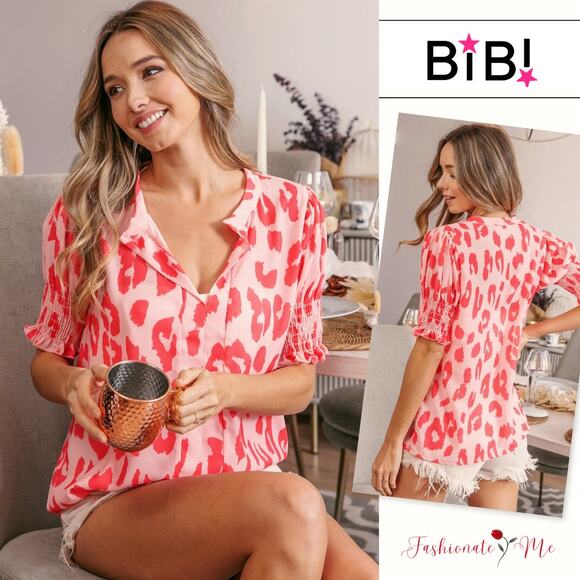 BiBi Leopard Pattern Smocked Short Sleeves V-Neck Relaxed Fit Blouse | Coral - Picture 1 of 6
